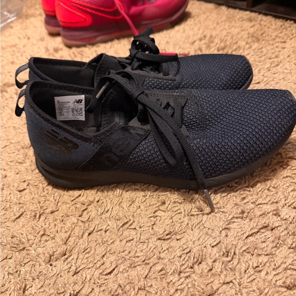 New Balance women’s black Athletic Shoes